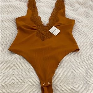FREE PEOPLE: Mustard/ yellow lace bodysuit